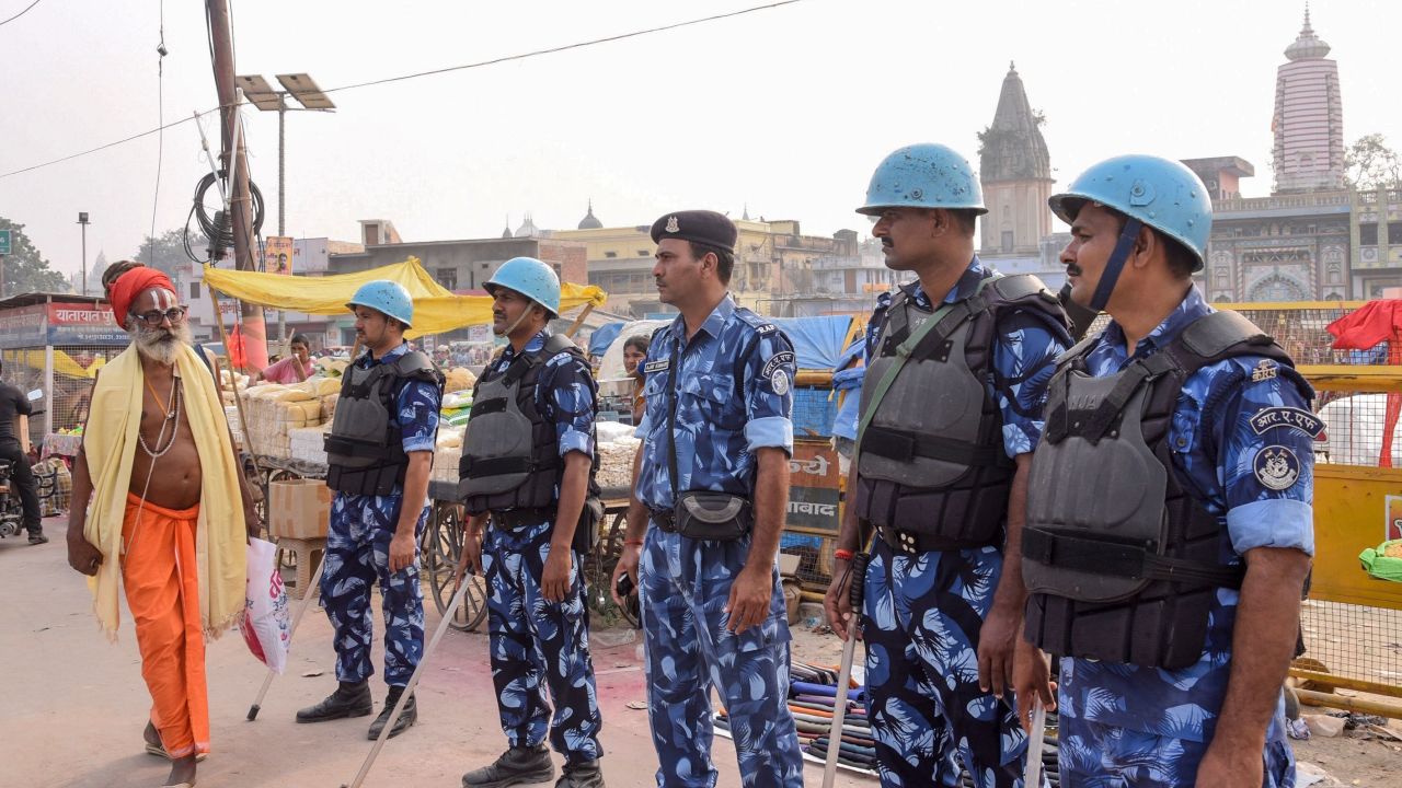 Security personnel stand guard on a street in Ayodhya on November 7, 2019, ahead of a Supreme Court verdict on the future of the site of the 16th-century Babri mosque.
