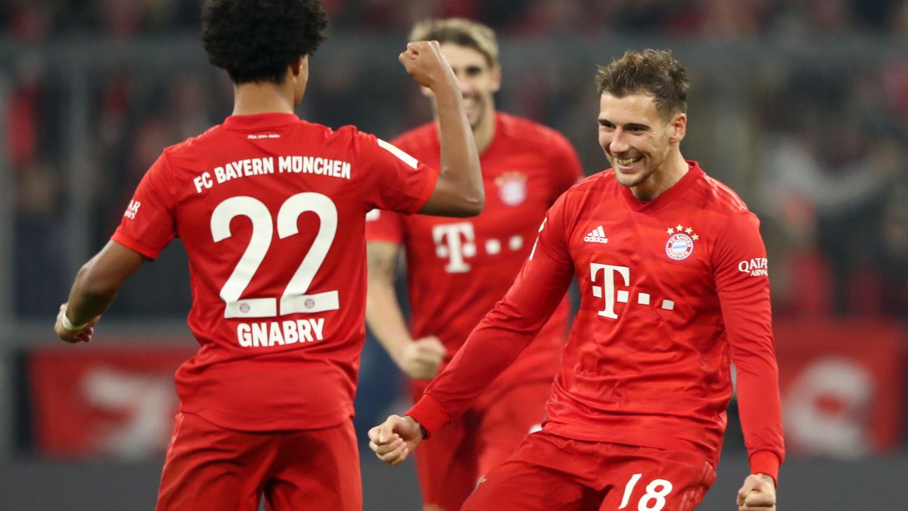 Serge Gnabry celebrates with  teammate Leon Goretzka after scoring his team's second goal during the 4-0 defeat of Borussia Dortmund at the Allianz Arena.