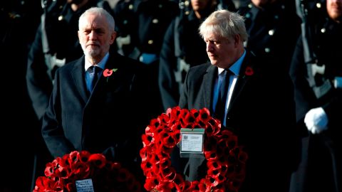The UK's Prime Minister Boris Johnson and opposition Labour Party leader Jeremy Corbyn prepare to lay wreaths as they take part in the Remembrance Sunday ceremony.