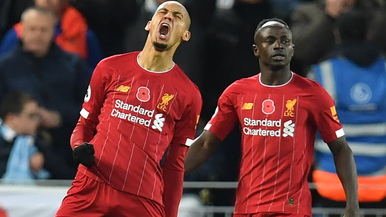 Liverpool's Brazilian midfielder Fabinho  celebrates after scoring the opening goal in the 3-1 win over Manchester City at Anfield.