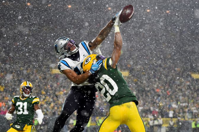 Kevin King #20 of the Green Bay Packers breaks up a pass intended for D.J. Moore #12 of the Carolina Panthers during the fourth quarter of the game on November 10 in Green Bay, Wisconsin.