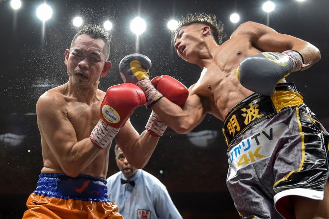 Naoya Inoue of Japan (R) and Nonito Donaire of Philippines (L) fight in their World Boxing Super Series bantamweight final in Saitama, Japan on November 7.
