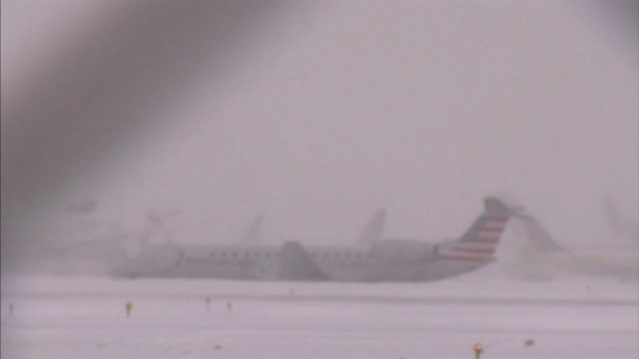 Plane slides off runway at Chicago's O'Hare amid icy conditions CNN