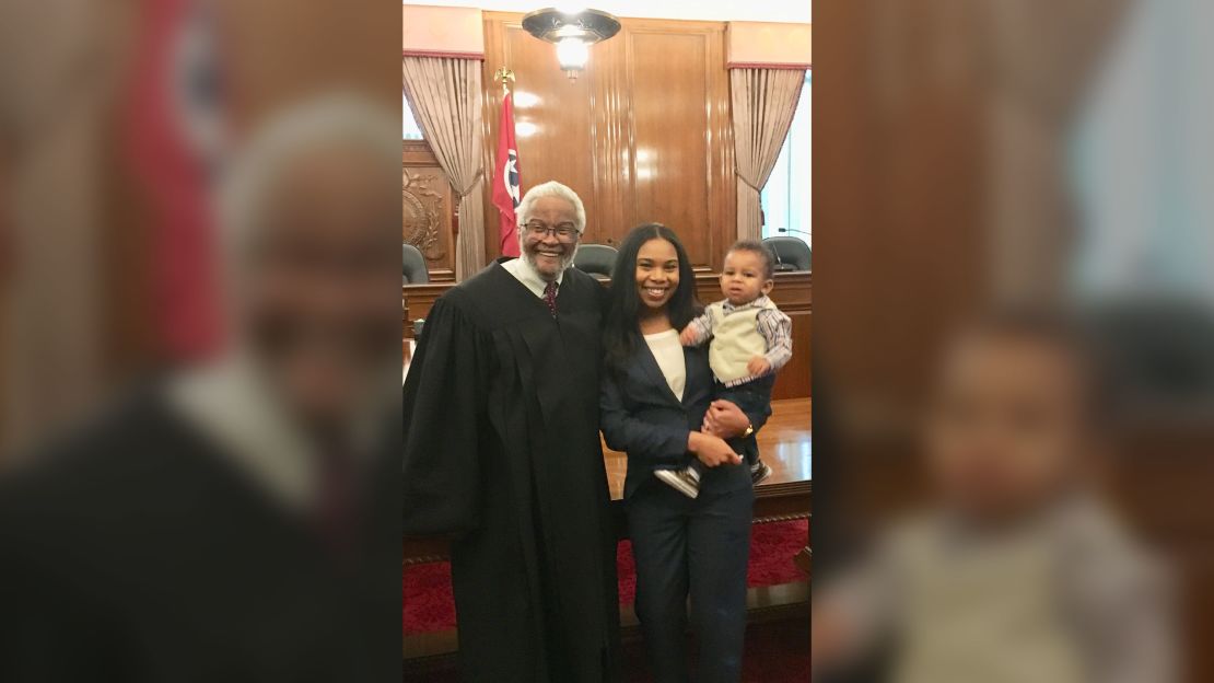 judge holds baby during swearing in 3