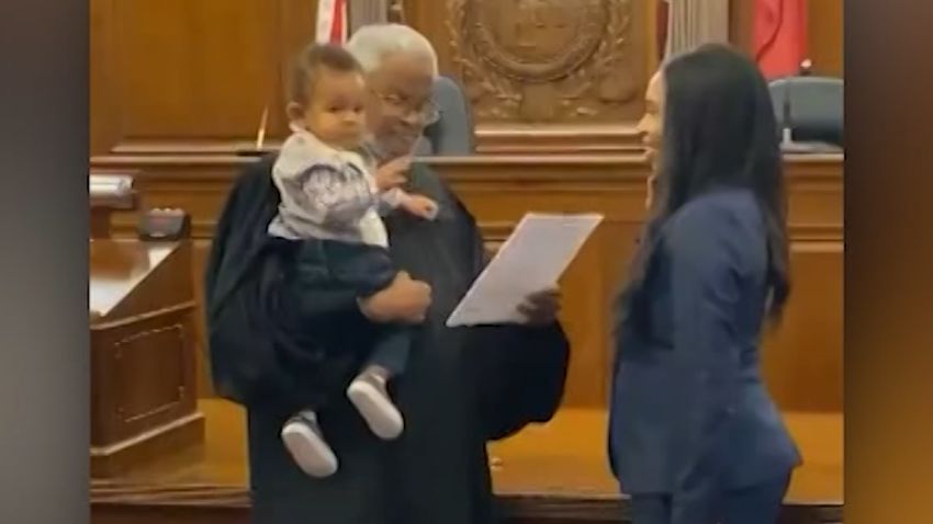 judge holds baby