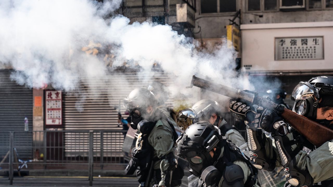 Riot police fire tear gas to disperse protesters on November 11, 2019 in Hong Kong.