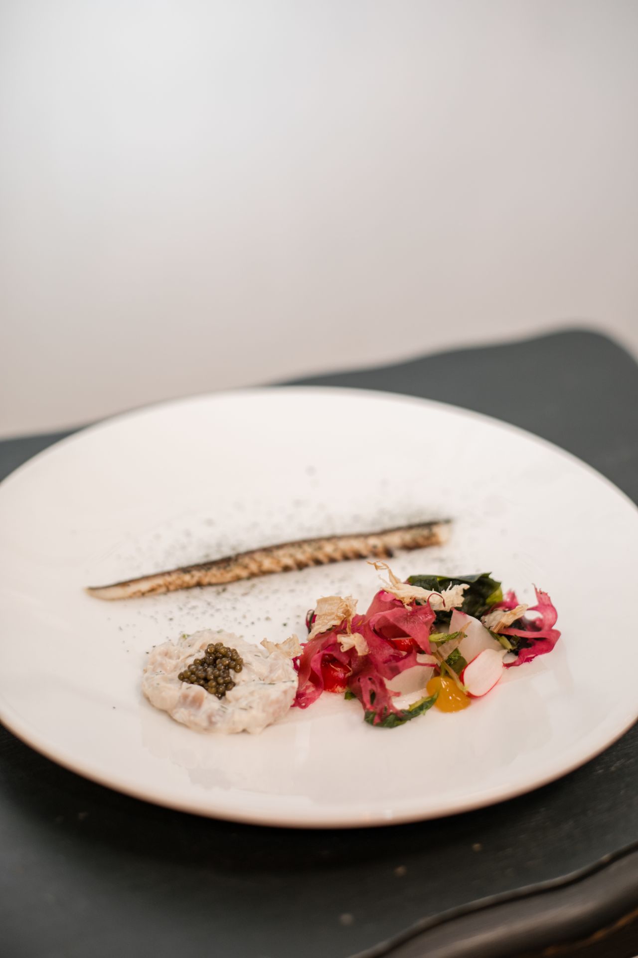 Among Blanc's treats are scorched mackerel, horseradish tartare and pickled vegetables.