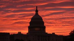 The sky turns to a fiery color as the sun begins to rise behind the U.S. Capitol building, on November 7, 2019 in Washington, DC. 