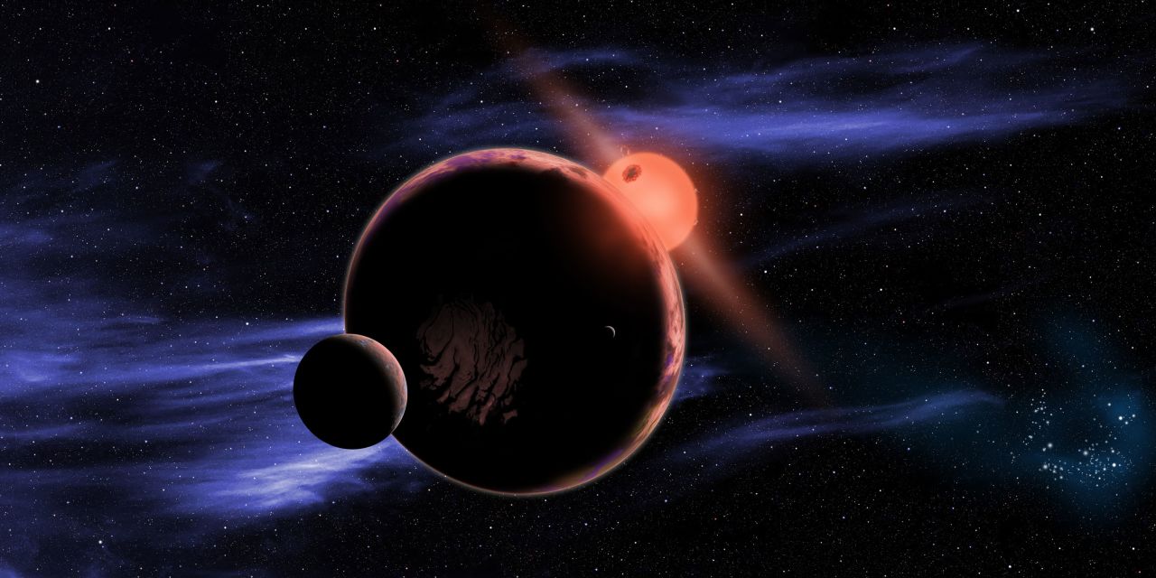 This artist's concept illustration shows an exoplanet with two moons orbiting within the habitable zone of a red dwarf star.