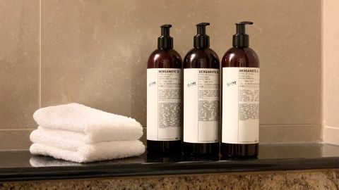 The new large-format bottles Hyatt Hotels will be replacing portable toiletries with.