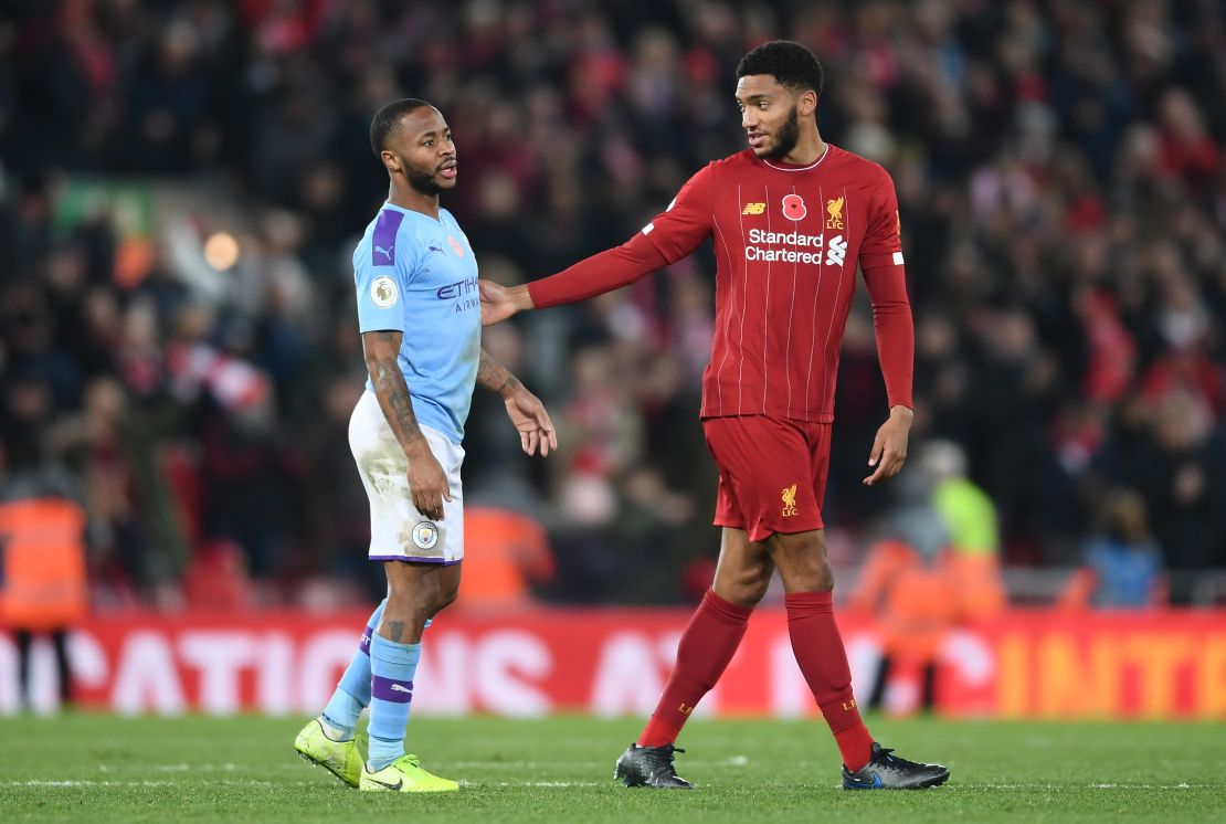 Raheem Sterling speaks with Joe Gomez following the English Premier League match between Liverpool and Manchester City on Sunday. 