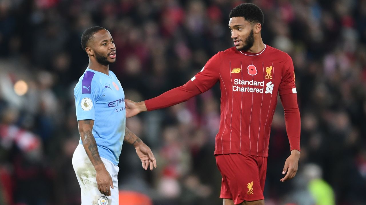 Raheem Sterling speaks with Joe Gomez following the English Premier League match between Liverpool and Manchester City on Sunday. 