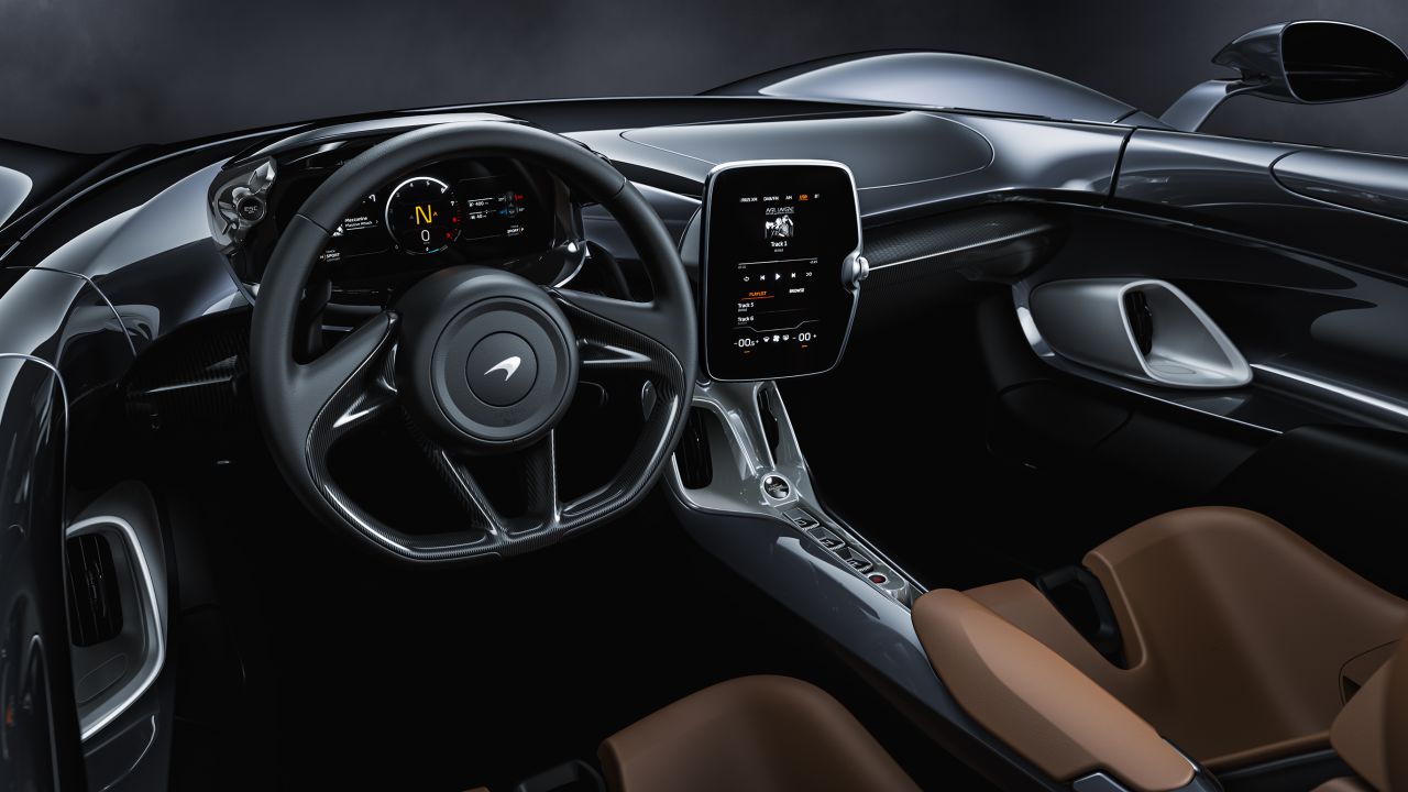 Controls for different drive modes, including Sport, Comfort and Track, are on the steering wheel.