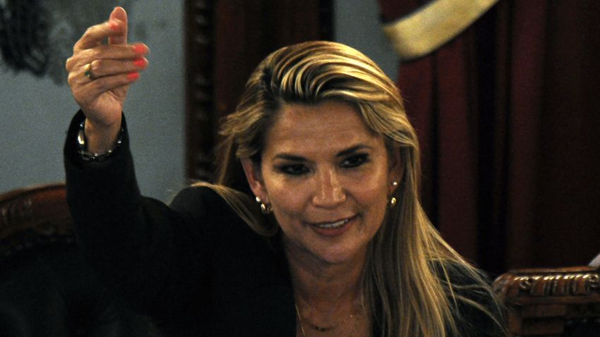Bolivian senator Jeanine Anez, gestures after proclaiming herself the country's new interim president during a session of Congress, despite it failed to reach a quorum, on November 12, 2019 in La Paz. - Lawmakers had been summoned to formalize Sunday's resignation of Evo Morales and confirm 52-year-old Anez as interim president. Anez, second vice-president of the Senate, is constitutionally next-in-line for the presidency after the vice-president and leaders of both houses of Congress resigned along with Morales. (Photo by JORGE BERNAL / AFP) (Photo by JORGE BERNAL/AFP via Getty Images)