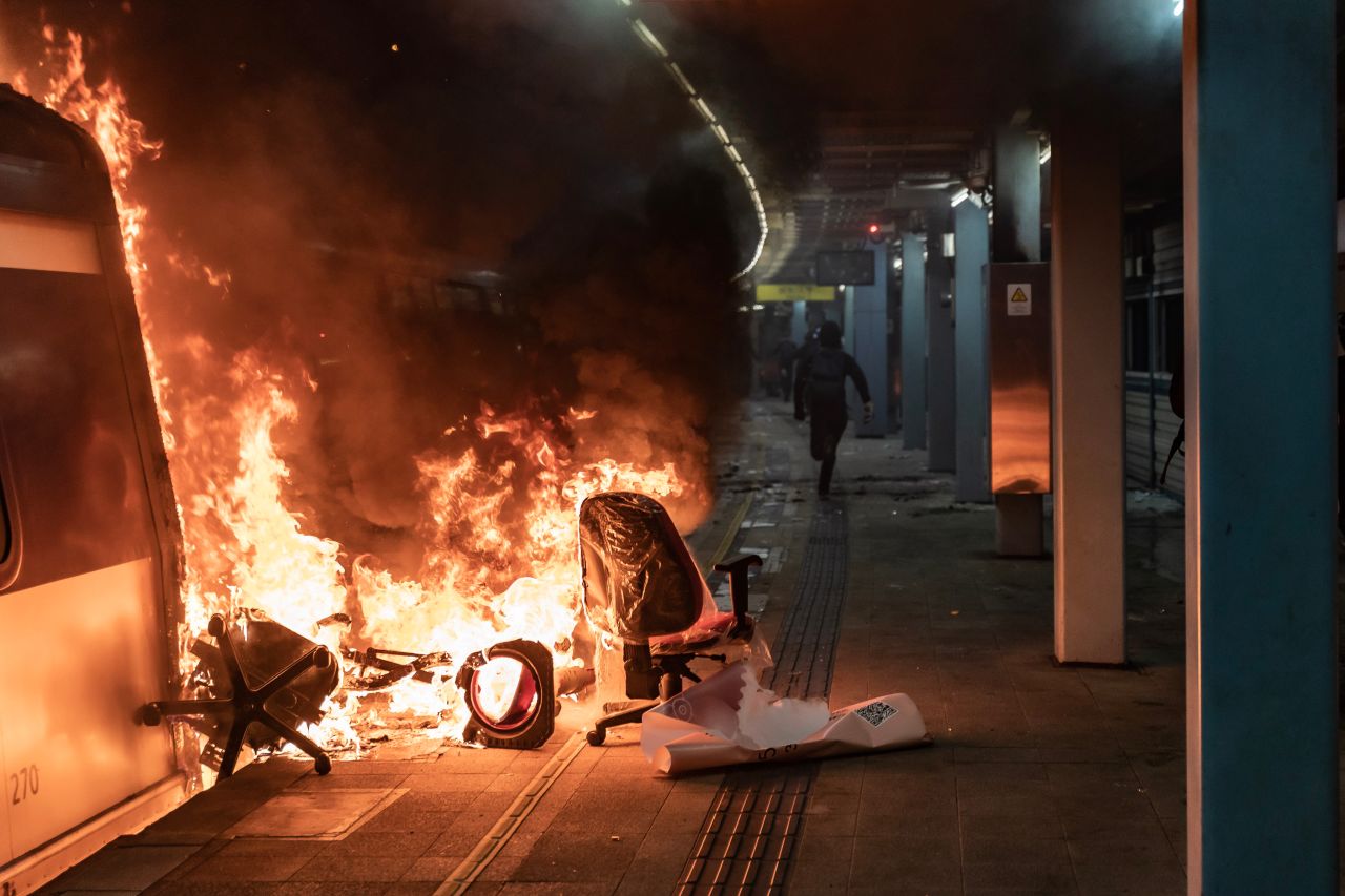 A fire is seen at a Mass Transit Railway (MTR) station during a demonstration at The Chinese University of Hong Kong on November 13.