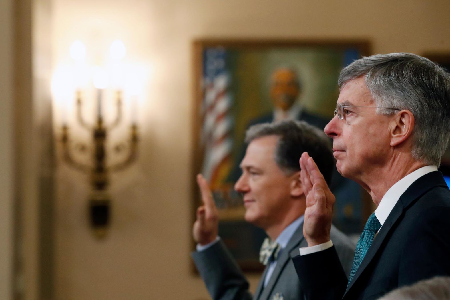 From right, diplomats Bill Taylor and George Kent are sworn in before testifying to the House Intelligence Committee on November 13. It was the <a href="index.php?page=&url=https%3A%2F%2Fwww.cnn.com%2F2019%2F11%2F13%2Fpolitics%2Fpublic-impeachment-hearings-day-1%2Findex.html" target="_blank">first public hearing</a> related to the inquiry. Taylor is the top US diplomat in Ukraine. Kent is the deputy assistant secretary at the State Department's Bureau of European and Eurasian Affairs.