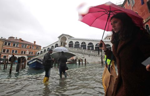 The high tide is seen near the Rialto Bridge in Venice.