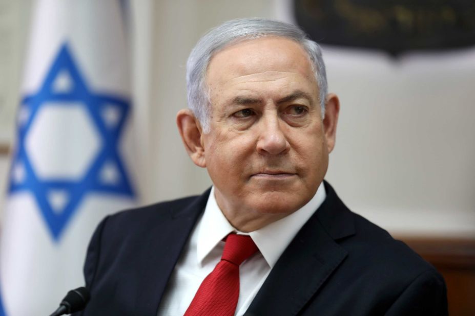 Israeli Prime Minister Benjamin Netanyahu chairs the weekly cabinet meeting at his office in Jerusalem on October 27.