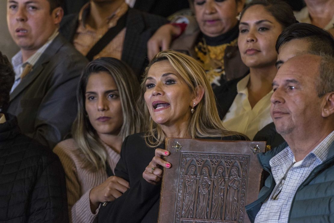 Anez (center), a member of the Democratic Union Party and second vice president of the Senate, after she declared herself as interim President.