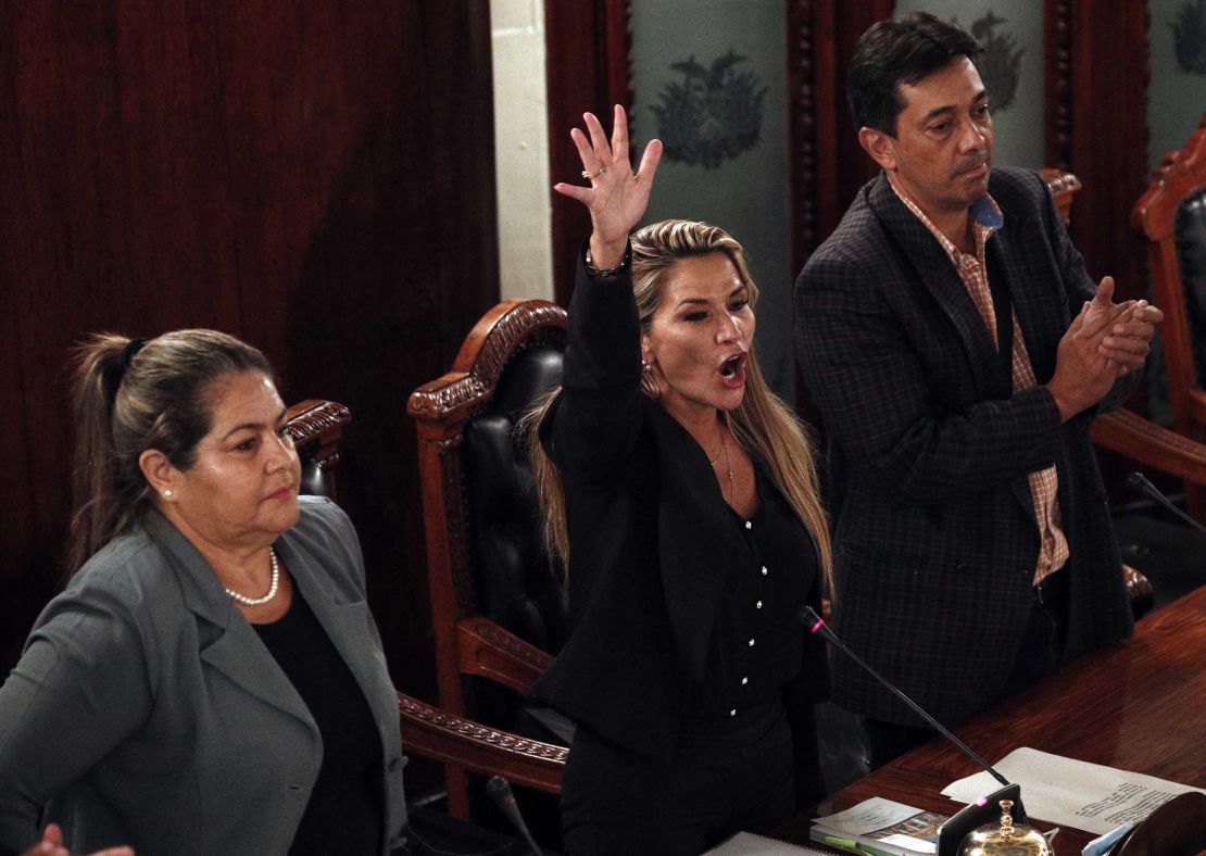 Jeanine Anez, center, declares herself Bolivia's interim president during a Congress session.