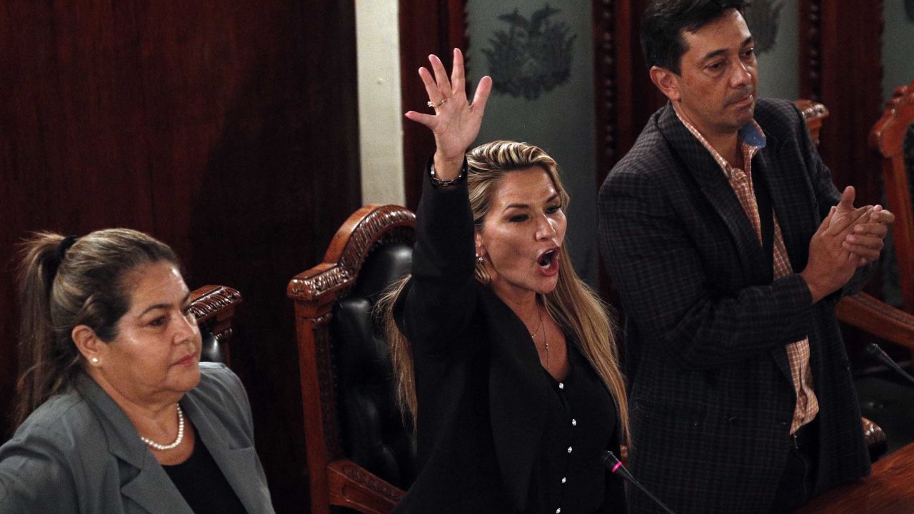 Jeanine Anez, center, declares herself Bolivia's interim president during a Congress session.
