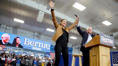 Democratic presidential candidate Sen. Bernie Sanders, I-Vt., and Rep. Alexandria Ocasio-Cortez, D-N.Y., greet supporters on the campus of Iowa Western Community College in Council Bluffs, Iowa, Friday, November 8.
