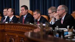 From left, Daniel Goldman, director of investigations for the House Intelligence Committee Democrats, House Intelligence Committee Chairman Adam Schiff, D-Calif., Rep. Devin Nunes, R-Calif, the ranking member, Steve Castor, the Republican staff attorney, Rep. Jim Jordan, R-Ohio, and Rep. Mike Conaway, R-Texas, listen to testimony as the panel holds the first public impeachment hearings of President Trump's efforts to tie U.S. aid for Ukraine to investigations of his political opponents, on Capitol Hill in Washington, Wednesday, Nov. 13, 2019.