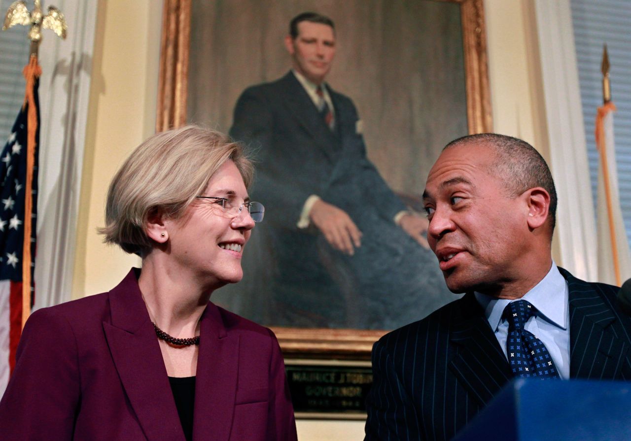 Patrick talks with US Sen.-elect Elizabeth Warren in November 2012.