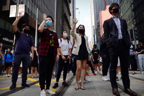 Demonstrators gather during a lunchtime protest in the financial district of Hong Kong on November 14.