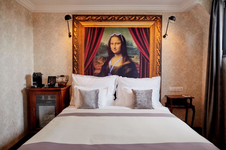 <strong>Fresh take: </strong>Some of the suites feature headboards with a modernized version of Leonardo Da Vinci's "Mona Lisa," complete with sunglasses and VIP passes to Budapest's Sziget Festival.<br />