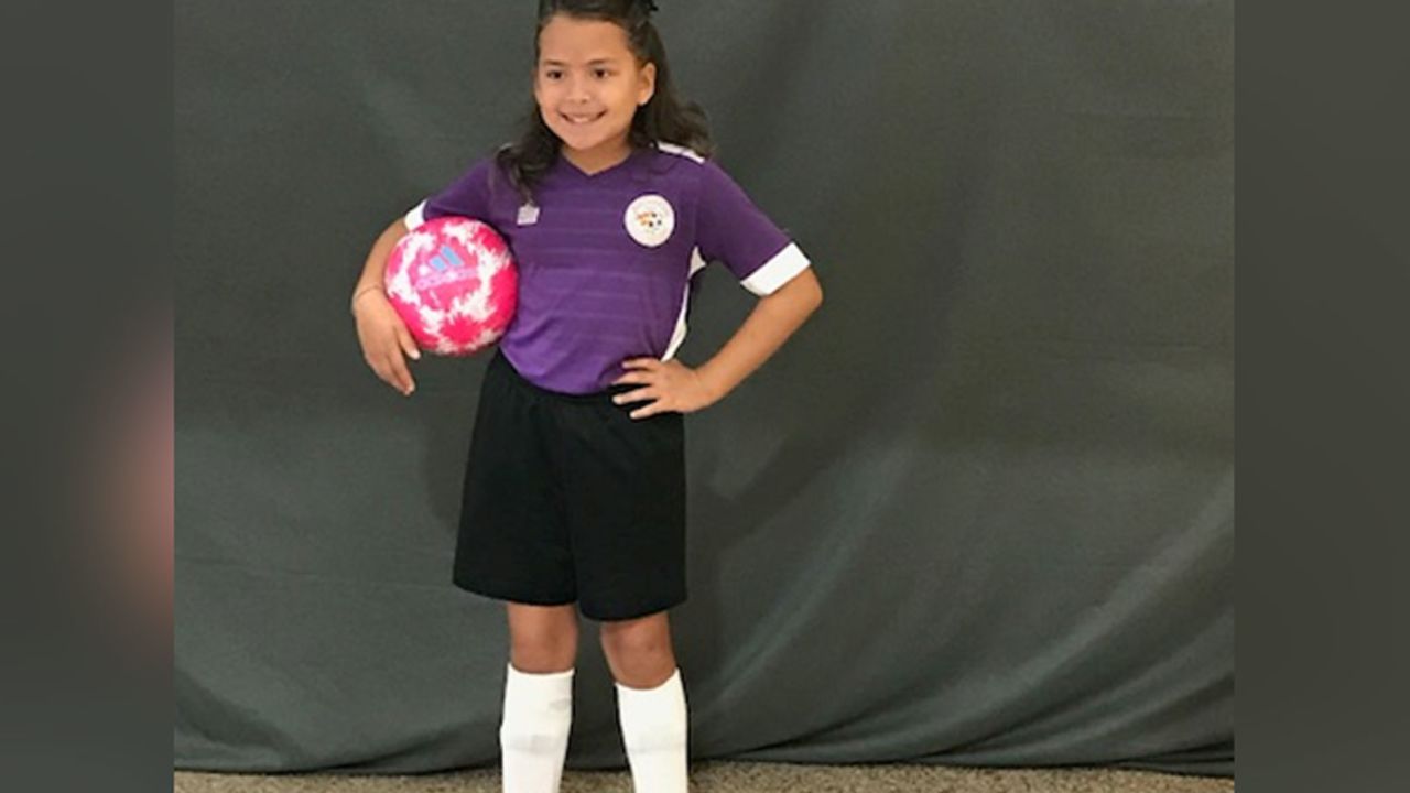 Abigail Moen stands tall in her soccer team uniform.