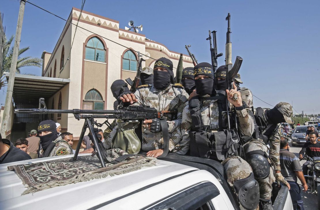 Islamic Jihad militants attend the funeral of a comrade in Khan Younis.