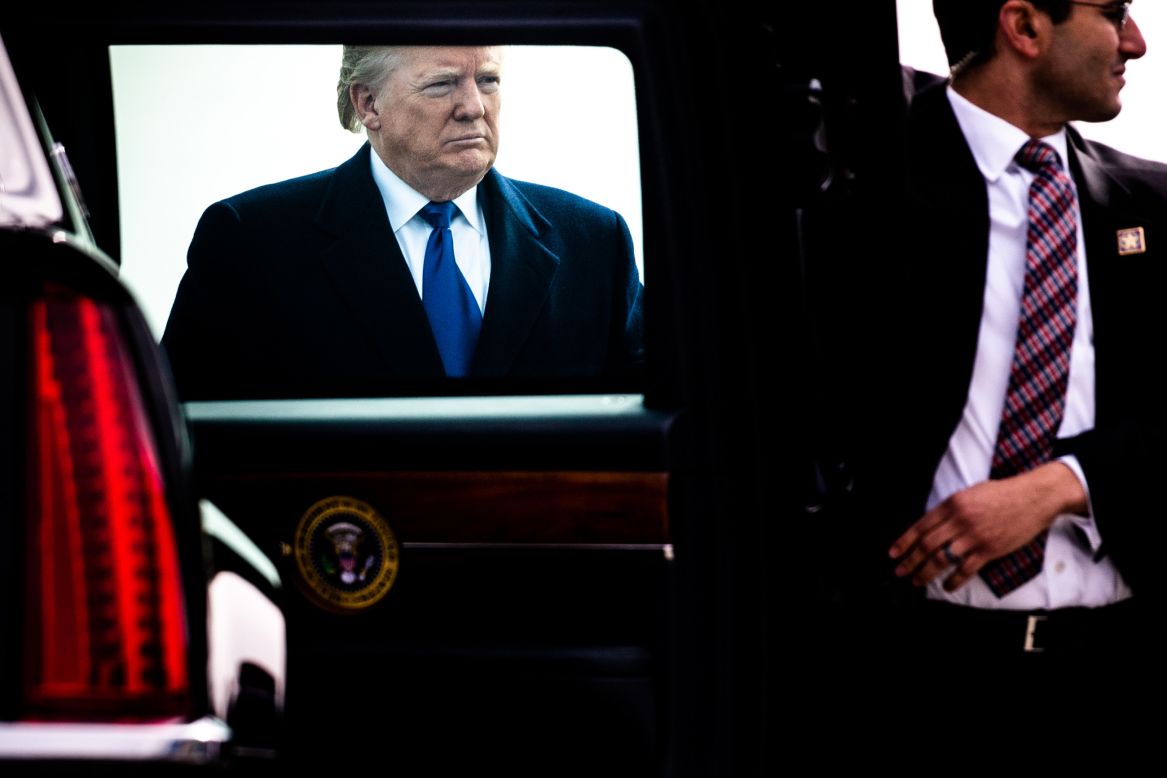 US President Donald Trump walks to his limousine at an air base in Marietta, Georgia, on Friday, November 8. He was in Georgia to attend a campaign fundraiser and roll out the Black Voices for Trump coalition.