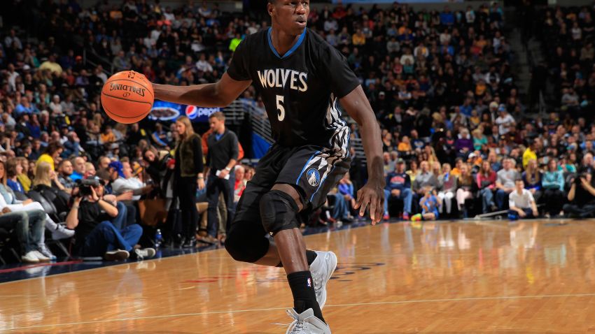 DENVER, CO - JANUARY 17:  Gorgui Dieng #5 of the Minnesota Timberwolves controls the ball against the Denver Nuggets at Pepsi Center on January 17, 2015 in Denver, Colorado. The Timberwolves defeated the Nuggets 113-105. NOTE TO USER: User expressly acknowledges and agrees that, by downloading and or using this photograph, User is consenting to the terms and conditions of the Getty Images License Agreement.  (Photo by Doug Pensinger/Getty Images)