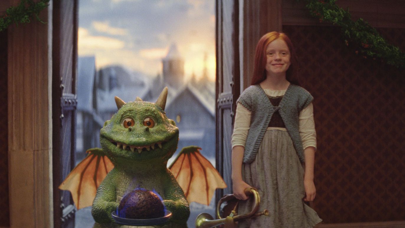 The ad features Edgar the eager dragon and his friend Ava.