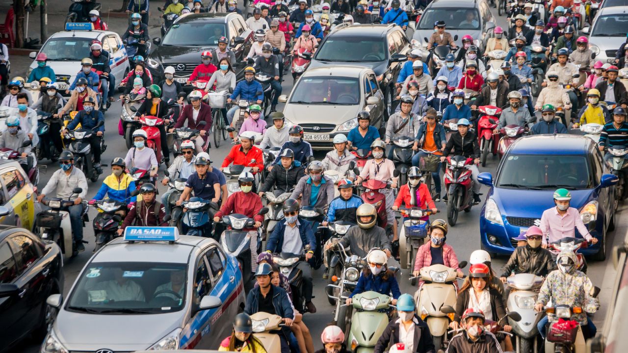 A common scene in the city of Hanoi, which is home to nearly six million motorbikes. 