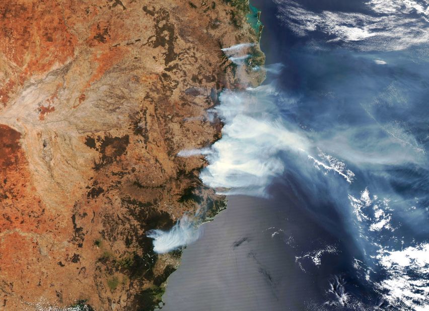 This satellite image shows wildfire smoke on November 14.