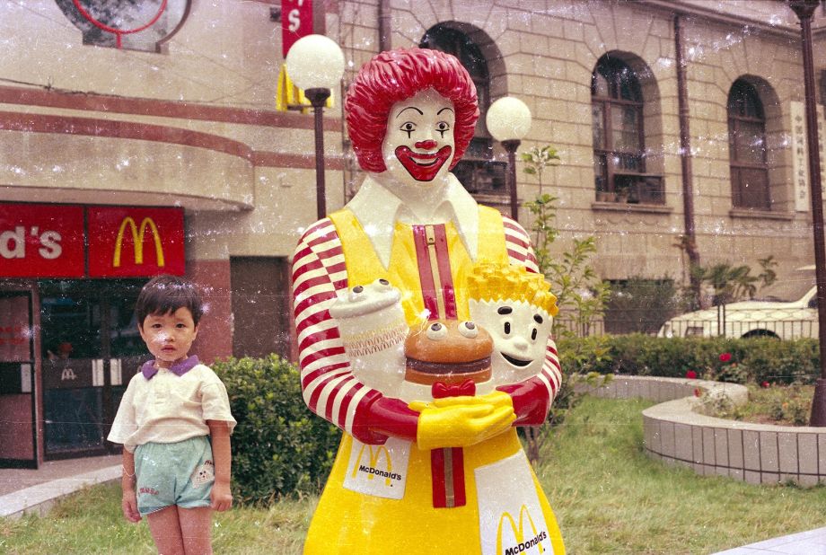 Sauvin has found a number of photos of people posing with statues of Ronald McDonald after Western fast food chains arrived in China in the early 1990s.