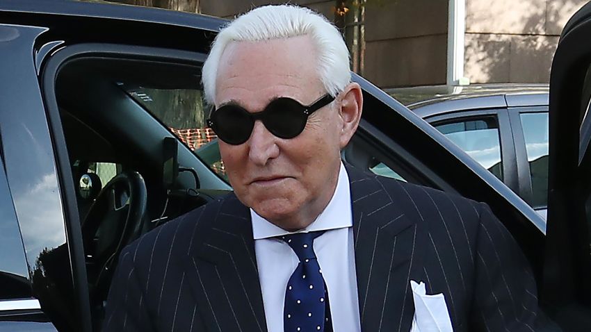 Roger Stone, former adviser to President Donald Trump, holds a bible as he arrives at the E. Barrett Prettyman United States Courthouse, on November 15, 2019 in Washington, DC.