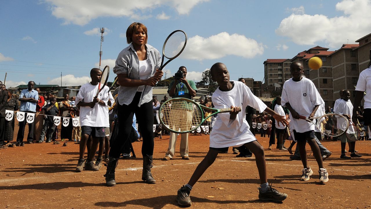 Williams plays tennis with pupils in Kibera, Kenya's largest slum.