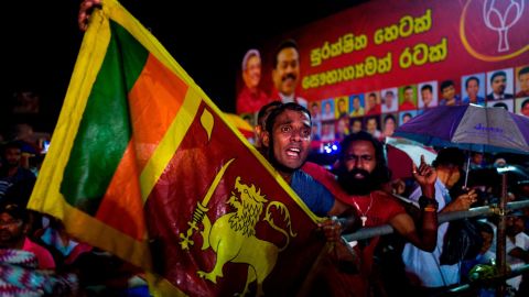 Supporters of Sri Lanka Podujana Peramuna (SLPP) party presidential candidate Gotabhaya Rajapaksa shout slogans during a campaign rally in Homagama on November 13, 2019, ahead of the November 16 presidential election.