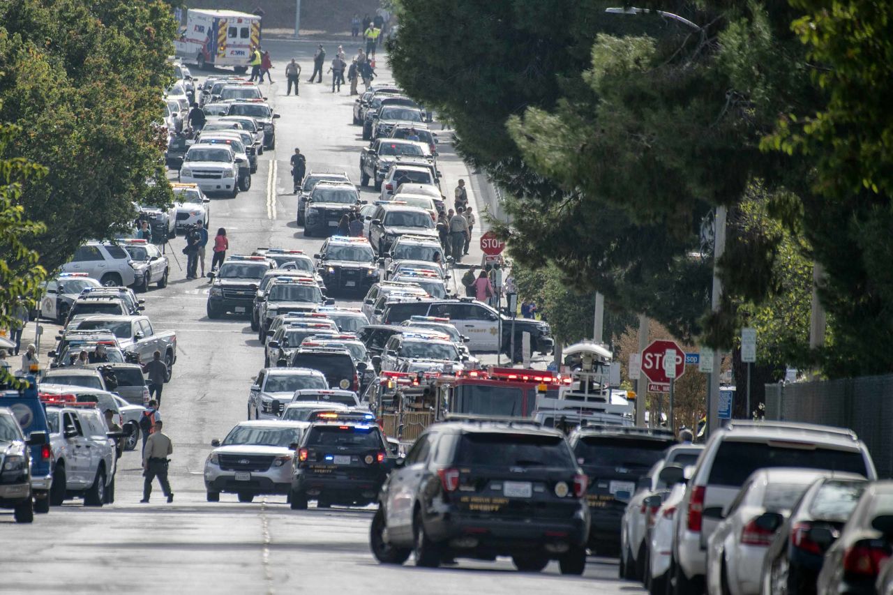 First responders' vehicles line Centurion Way outside Saugus High School on November 14.