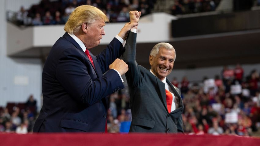 President Donald Trump stands with Louisiana Republican gubernatorial candidate Eddie Rispone during a campaign rally at the CenturyLink Center, Thursday, November 14, 2019, in Bossier City, Louisiana.