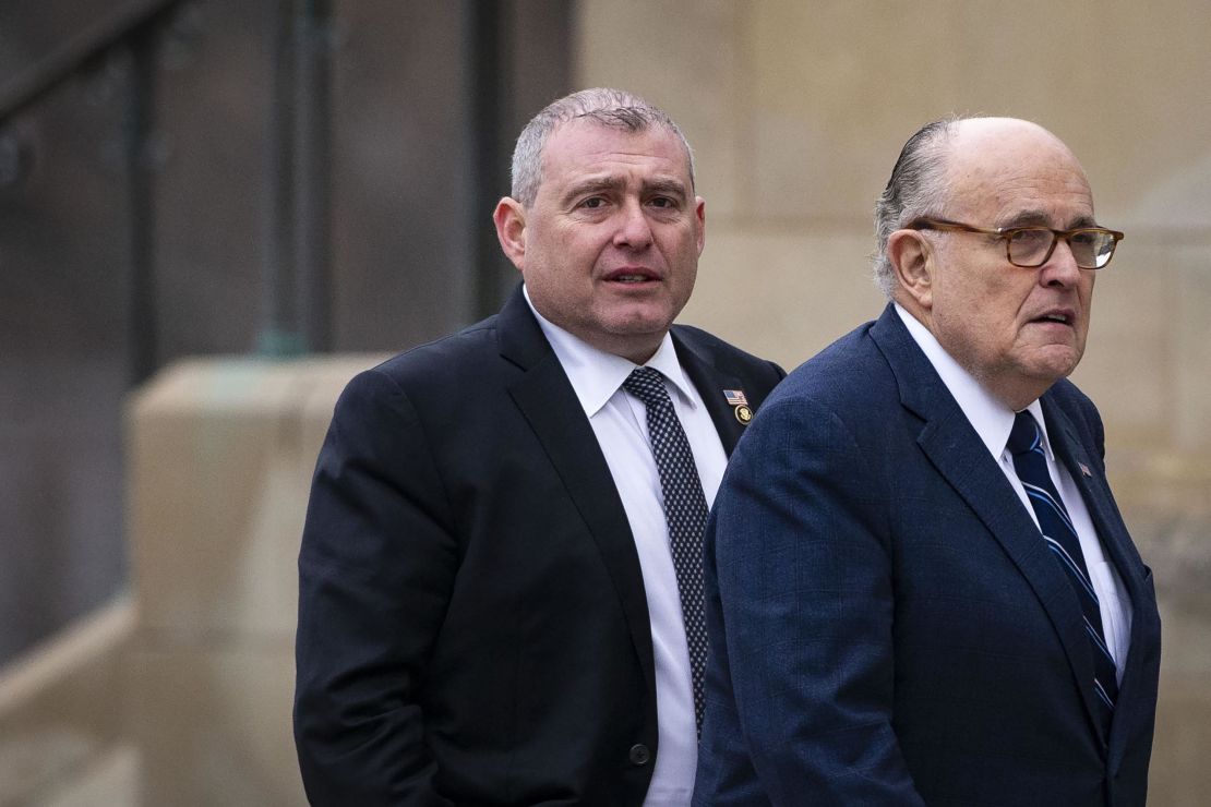 Rudy Giuliani, former mayor of New York, arrives with his associate Lev Parnas, left, before a state funeral service for former President George H.W. Bush at the National Cathedral in Washington, on Wednesday, December 5, 2018.