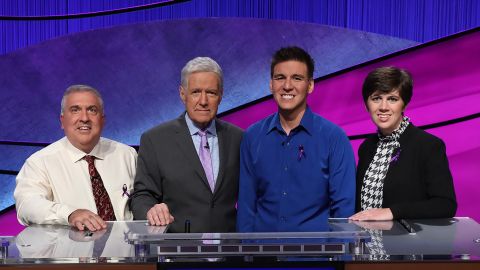 Francois Barcomb, Jeopardy! host Alex Trebek, James Holzhauer and Emma Boettcher at the show's Tournament of Champions. 