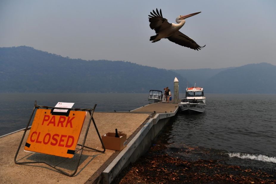 Bushfire smoke clouds the sky over the Hawkesbury River in Brooklyn, Australia.