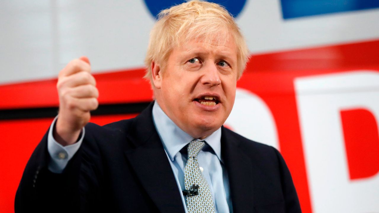 MANCHESTER, ENGLAND - NOVEMBER 15: Prime Minister Boris Johnson addresses his supporters prior to boarding his General Election campaign trail bus on November 15, 2019 in Manchester, England. (Photo by Frank Augstein-WPA Pool/Getty Images)