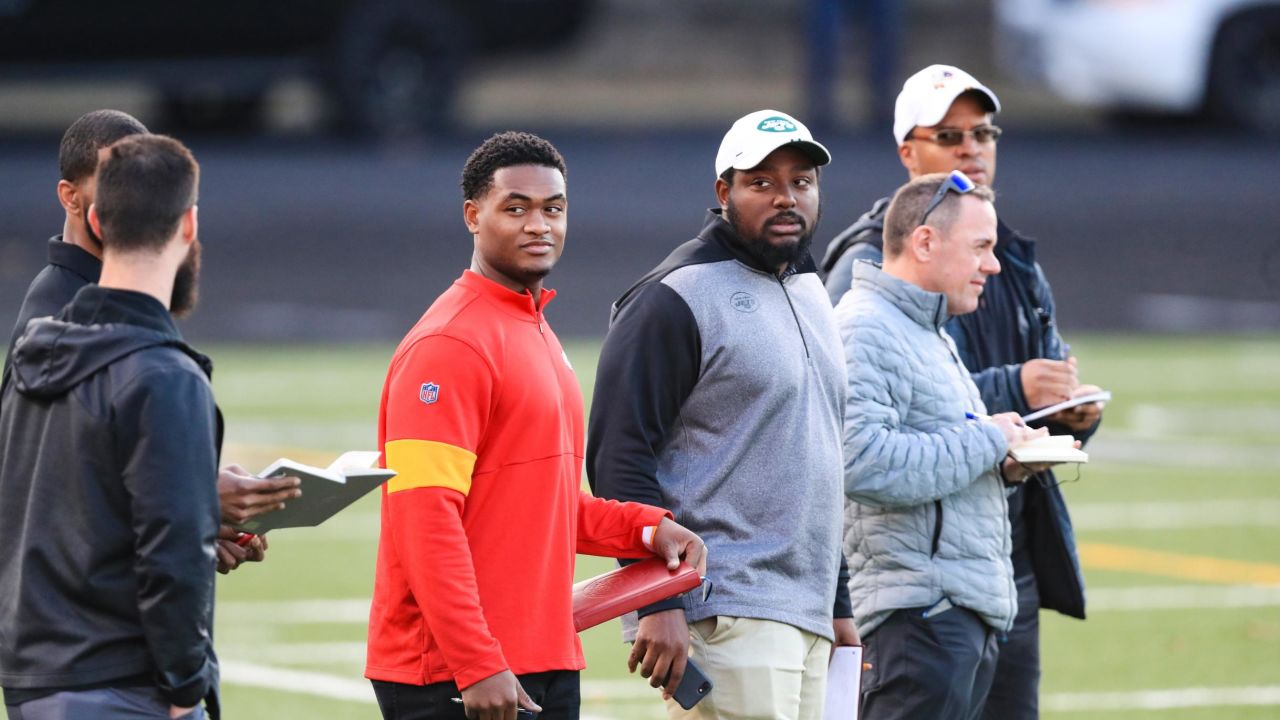 NFL scouts watch quarterback Colin Kaepernick during a private NFL workout in Riverdale, Georgia. 
