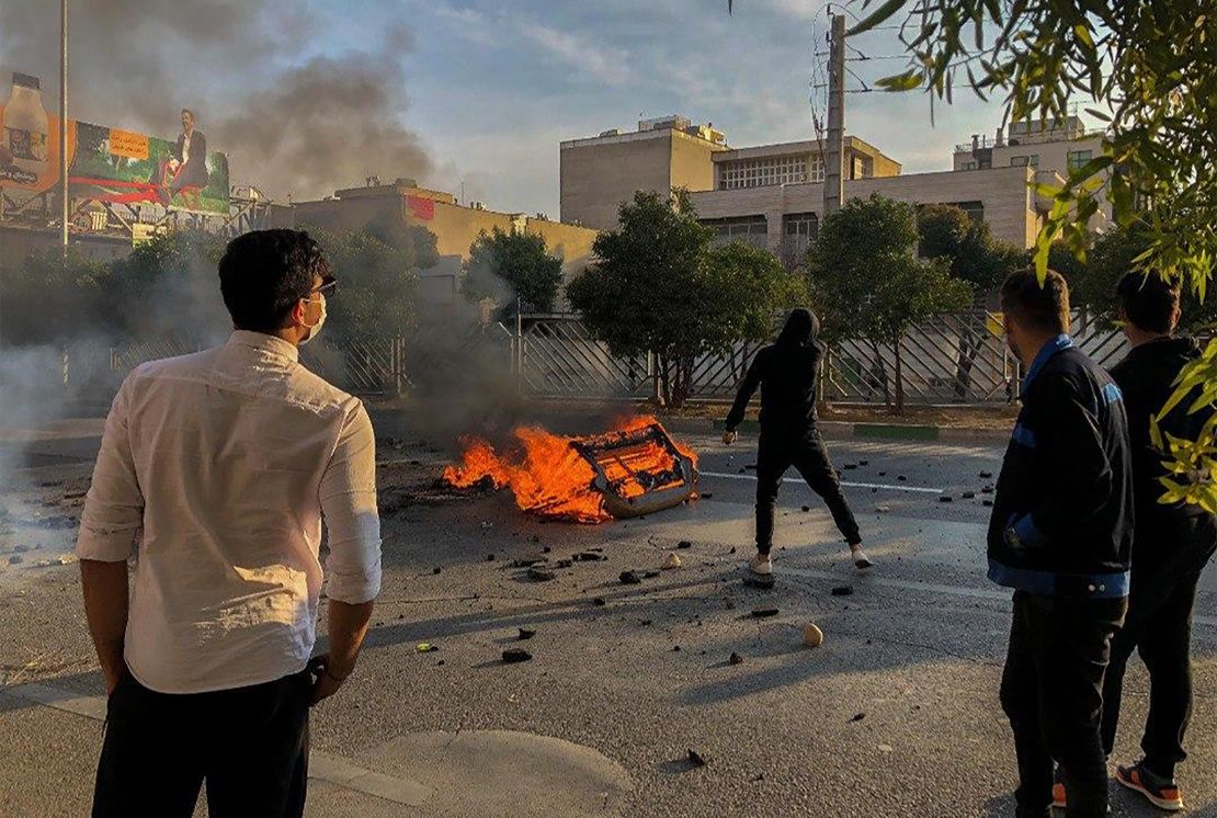 Iranian protesters block a road during a demonstration against an increase in gasoline prices in the central city of Shiraz on Saturday. 