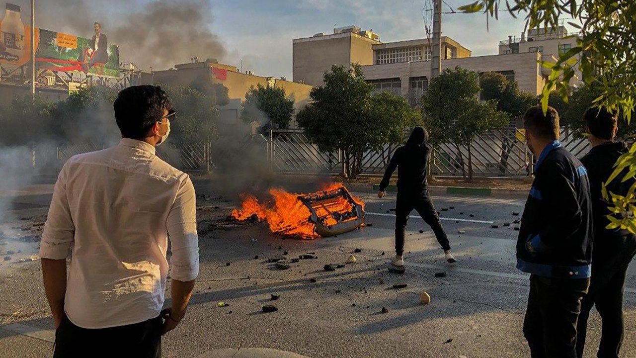 Iranian protesters block a road during a demonstration against an increase in gasoline prices in the central city of Shiraz on November 16, 2019.